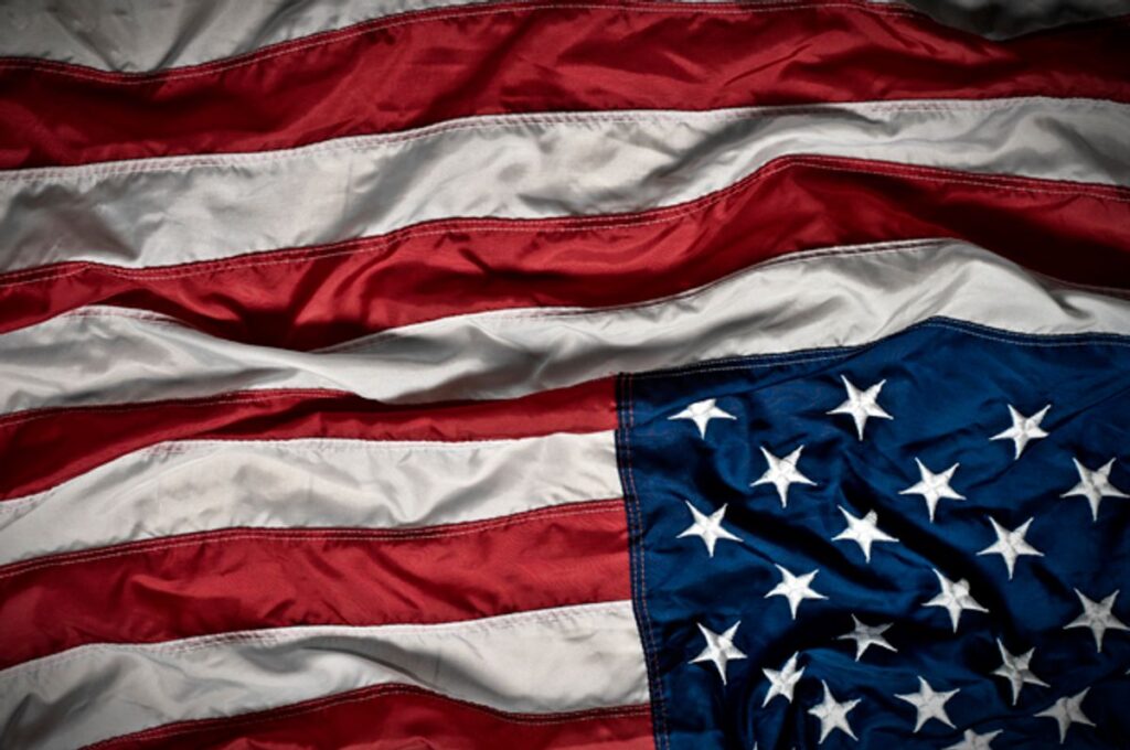 An image of a United States flag, upside down, indicating distress.